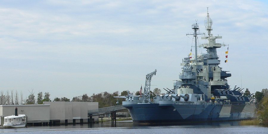 The battleship USS North Carolina near the mouth of the Cape Fear River in Wilmington