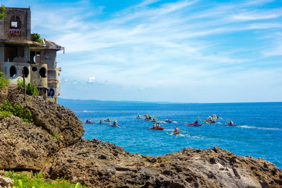 Traditional fluvial parade by fishermen at a beach in Binongkalan, Catmon, Cebu, Philippines.