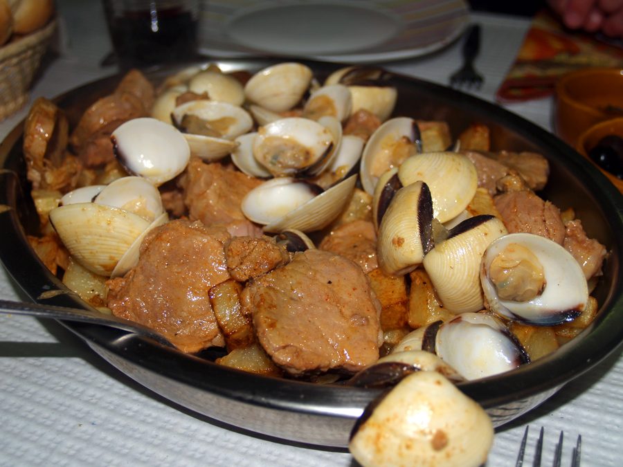 Carne de porco à Alentejana, a traditional Alentejo pork dish with clams, potatoes and coriander