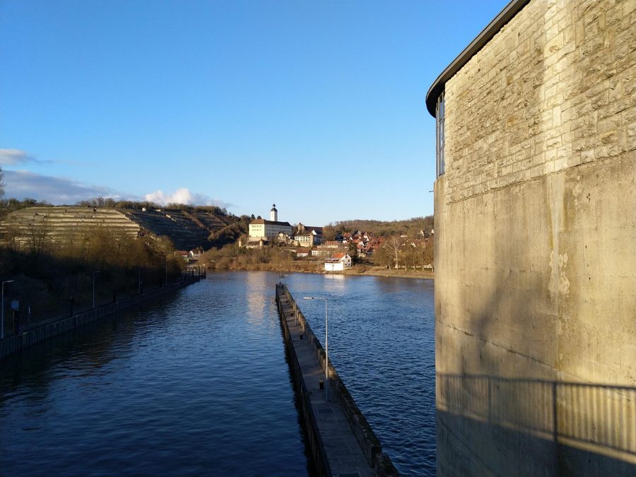 View from the Neckar lock in Gundelsheim of the town and Horneck Castle
