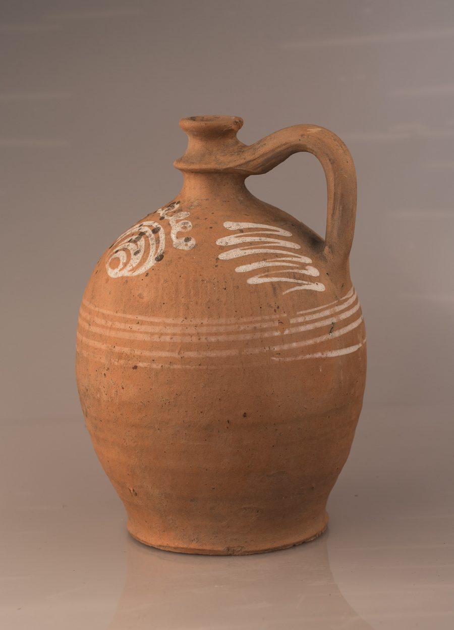 Historic unglazed Stoober Plutzer ceramic jug with decorative ornamentation