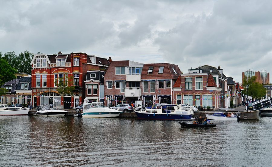 Canals in Sneek with riverside houses and boats
