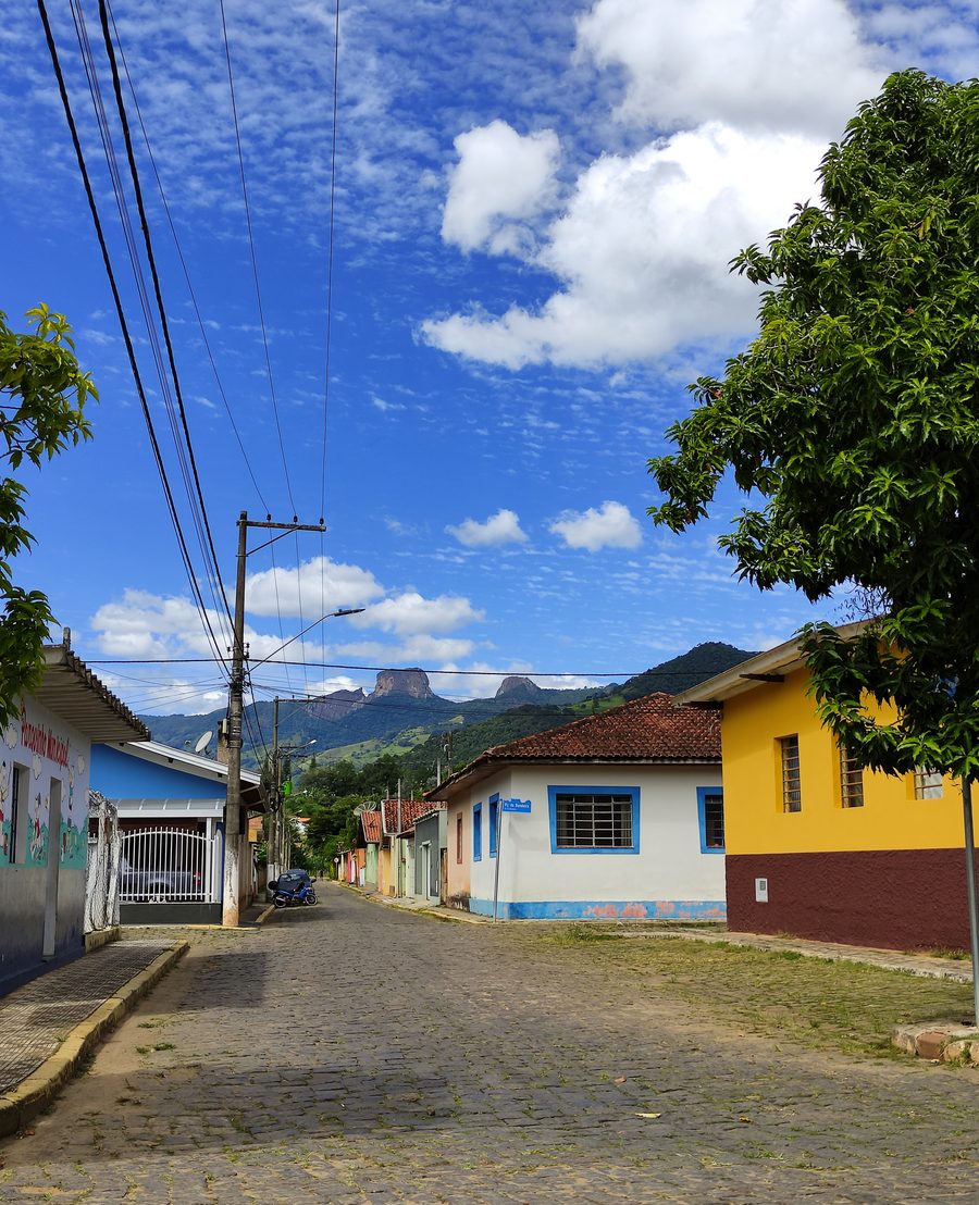 Empty street in the center of São Bento do Sapucaí with Pedra do Baú in the background