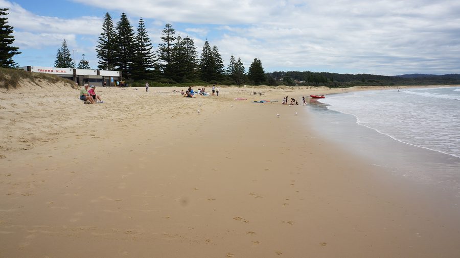 Tathra Beach with coastline and a view toward the Surf Life Saving Club