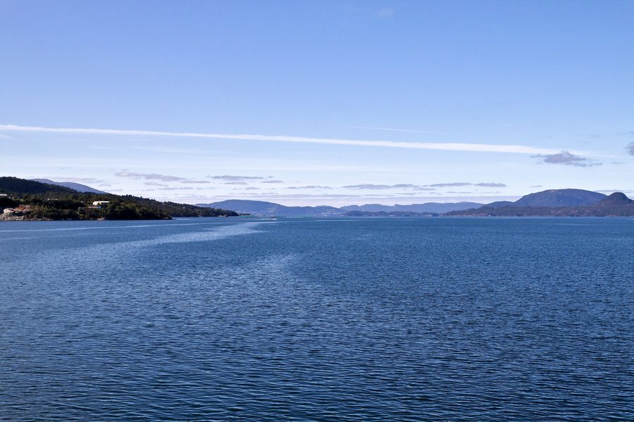 Skånevikfjord seen from the ferry between Skånevik and Utåker, with the island of Halsnøy on the right.