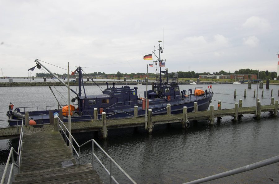 Harbor of the former naval base Olpenitz with ship