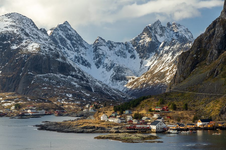 The fishing villages Tind and Å on the Lofoten in front of steep mountains.