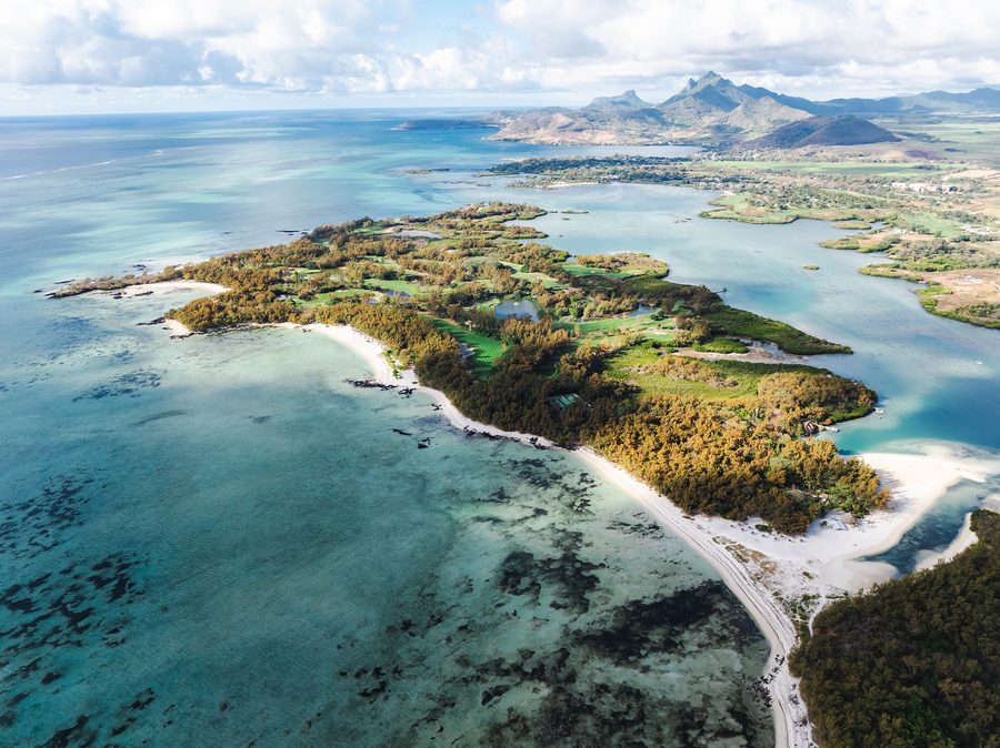 Île aux Cerfs off Mauritius with turquoise water.