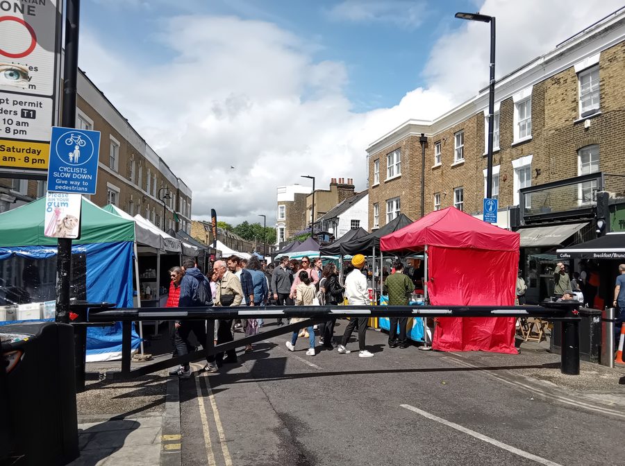 Broadway Market in Hackney with market stalls and an urban setting