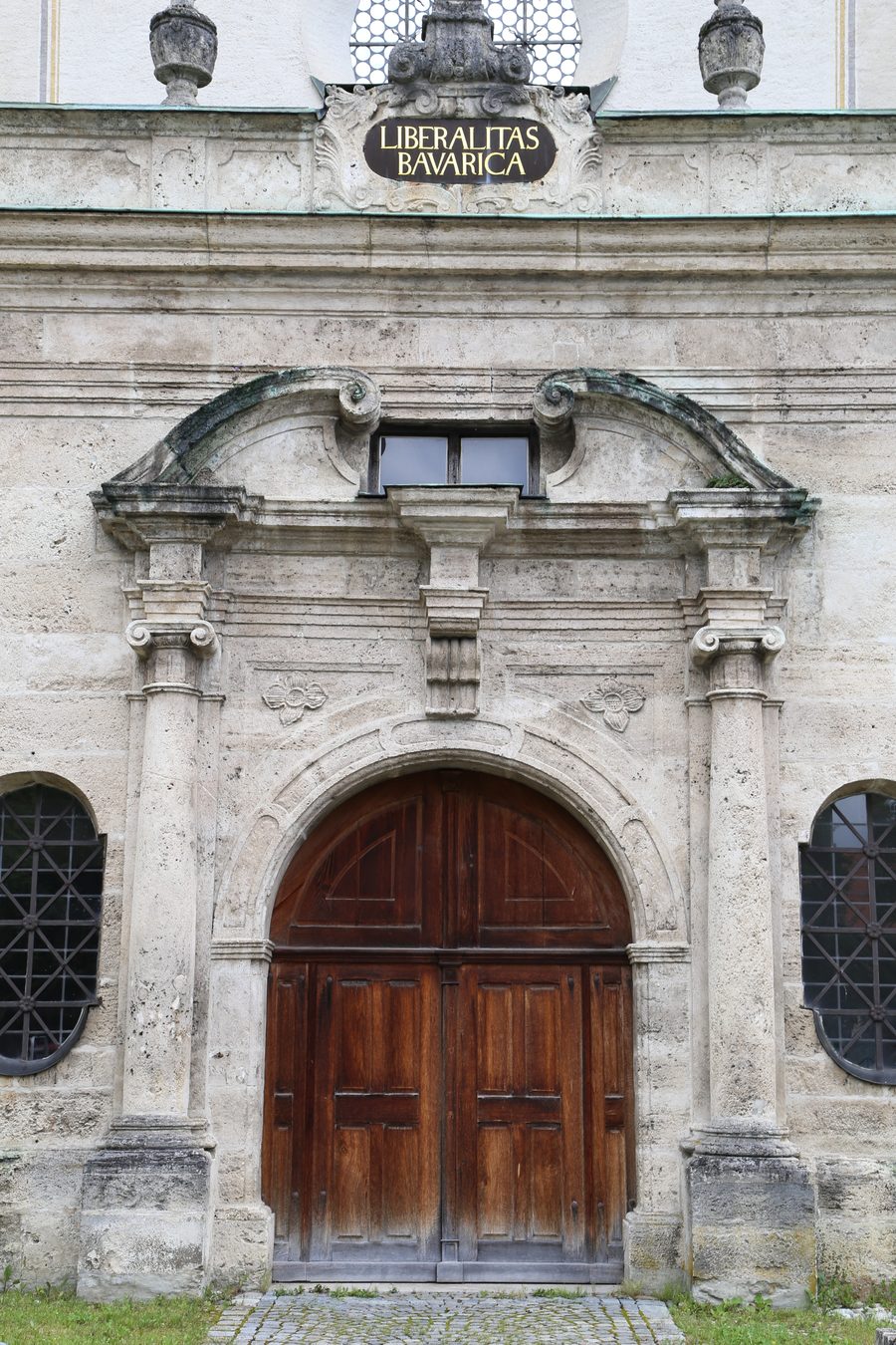 Portal of the parish church of the Holy Cross in Polling
