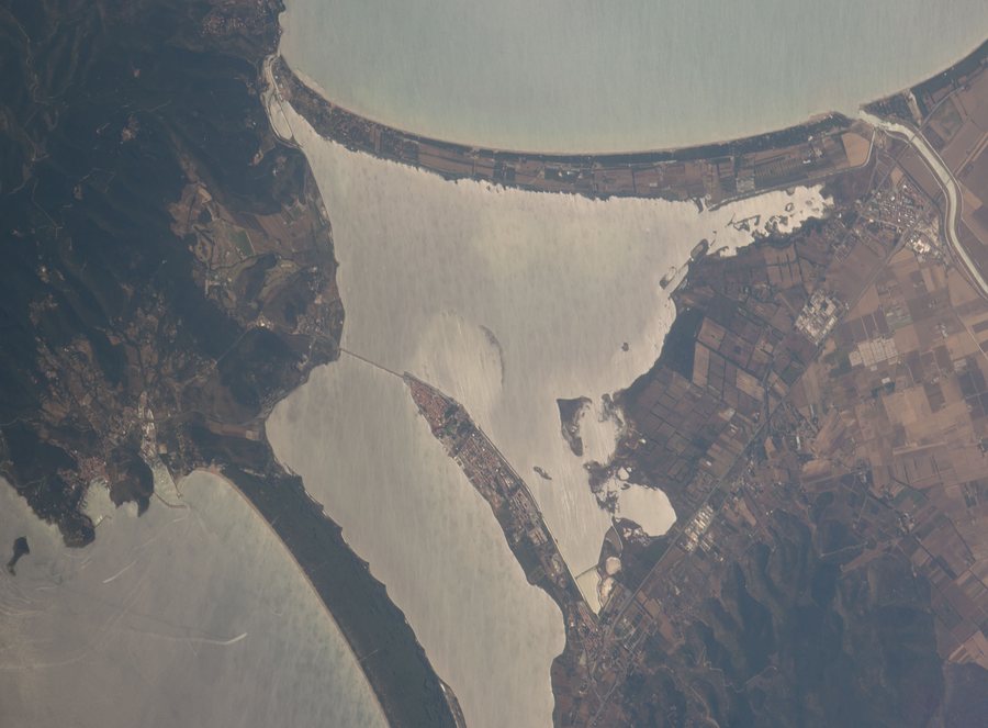 File:ISS048-E-72257 - View of Italy - Orbetello - Porto Ercole - Laguna di Ponente - Tombolo della Gianella - Fiume Albegna - Albinia (cropped).jpg