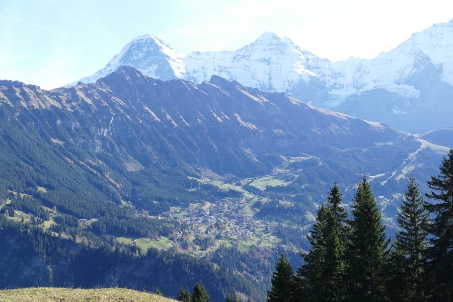 Wengen viewed from Isenfluh, in the background, the Eiger, Mönch, and Jungfrau peaks rise