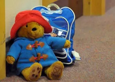 Children's backpack and teddy bear for the trip